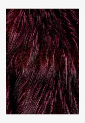 Faux fur fabric in deep red and black hues, featuring long, wavy, soft strands with varied textures and color blending for depth.