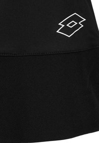 Black sports skirt made of smooth fabric with a textured hem. Features a white logo accent along the lower edge.