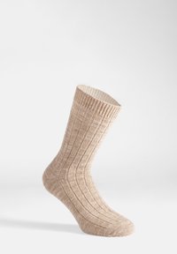 Calzino beige a costine con superficie texture, materiale morbido, alto gambale e punta liscia, adatto per l'abbigliamento casual.