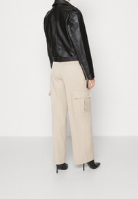 Gina Tricot Jacka i konstläder - black