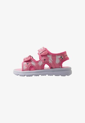 Pink children's sandals with a closed toe, adjustable velcro straps, and floral patterns, featuring a white rubber sole and breathable design.