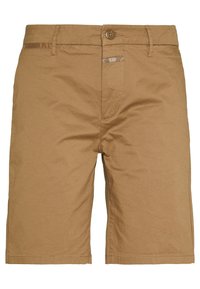 Spodenki chino z tkaniny bawełnianej w kolorze beżowym, z zapięciem na guzik z przodu, dwoma bocznymi kieszeniami i zamkiem błyskawicznym. Charakteryzują się czystym, prostym wzornictwem bez ozdób.