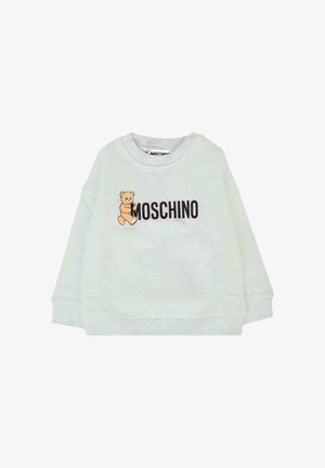 Felpa verde chiaro in cotone con colletto e polsini a costine. Presenta una grafica di orsetto e il testo "MOSCHINO" in nero.