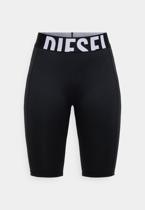 Črne kolesarske hlače s širokim belim pasom z logotipom, narejene iz gladkega, raztegljivega blaga in oprijetega kroja.