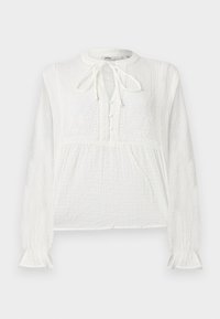 Λευκό μπλούζα με μακριά μανίκια από υφή υφάσματος, κεντημένα ανθισμένα μοτίβα, κουμπωτό εμπρόσθιο μέρος και λεπτομέρεια δεσίματος στο λαιμό.