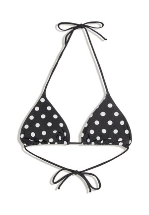 Črni bikini top v obliki trikotnika z belimi pikami, z drobnimi trakovi za zvezavo okoli vratu in hrbta.