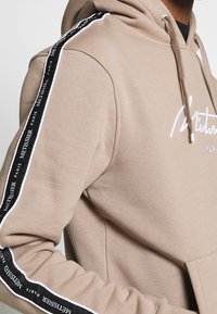 Metissier Mikina s kapucí - sand