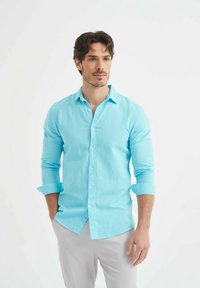 Non sélectionné, bleu turquoise