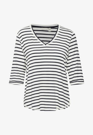 Bela in mornarsko modra črtasta majica z V-izrezom in rokavi do tri četrtine, s sproščenim krojem in zaobljenim robom. Mehka tkanina z okrasnimi šivi.