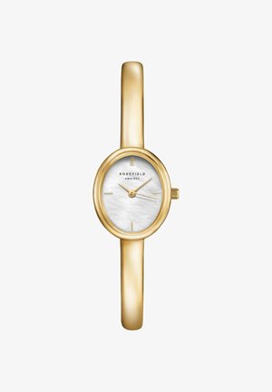 Montre bracelet fine ton or avec un cadran ovale en nacre blanche, des marqueurs dorés minimalistes et trois aiguilles dorées indiquant 10:10:15.