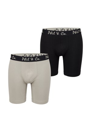 Black and beige boxer shorts with a soft, stretchy fabric. Features a thick waistband with "Phil & Co." logo in contrasting colors.