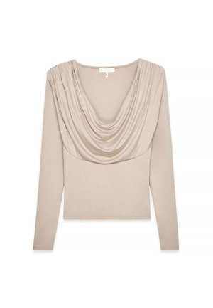 Ilgų rankovių marškiniai šviesiai beige spalvos. Yra su drapiruota apykakle ir aptemptu siluetu. Pagaminti iš minkštos, tamprios medžiagos su raukšlėtu paviršiumi.