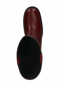 Botte étanche bordeaux avec un extérieur en cuir lisse, bout rond et doublure texturée noire. Hauteur cheville avec des languettes sur les côtés pour un enfilage facile.