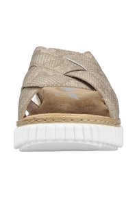 Beige sandal with woven texture, open toe, and cross straps. Foam sole in white with ridged pattern for traction.