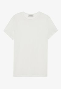 White cotton t-shirt with short sleeves, round neckline, and a simple design. Tag on the neck reads “ANNA FIELD.” Soft texture and no patterns.
