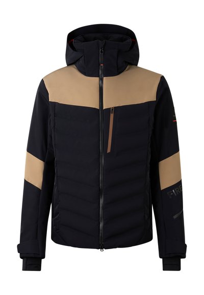 Marineblaue und beige isolierte Jacke mit Kapuze, ausgestattet mit einem Frontreißverschluss, einer Reißverschlusstasche auf der Brust und farblich abgesetzten Blöcken an den Ärmeln.