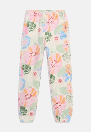 Kinderjoggingbroek met elastische taille, trekkoord en elastische boorden, met een pastel bloem- en bladpatroon op een crèmekleurige achtergrond.