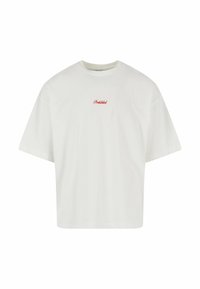 T-shirt blanc à manches courtes avec une coupe carrée, portant "Interdit" brodé en rouge sur la poitrine, fabriqué en coton doux.