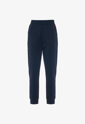 Pantaloni della tuta blu navy realizzati in tessuto morbido, con un design affusolato, polsini a costine, vita elastica e un piccolo dettaglio del logo rosso.