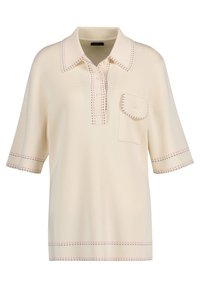 Krémové polokošile s krátkým rukávem s texturovaným pleteným vzorem, růžovými a černými švy, knoflíkovou légou a jednou kapsou na hrudi.