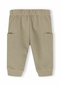 Khaki bomullbyxor med elastiskt midjeband, ribbade muddar och två sidfickor. Slät textur med en enkel, funktionell design.