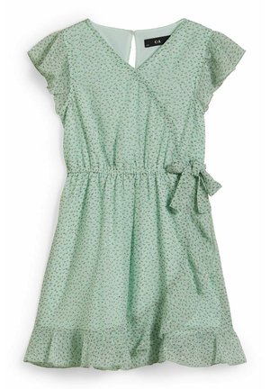 Robe vert menthe avec manches flottantes, design croisé, taille élastique et ourlet à volants. Présente un motif discret de feuilles et un détail noué sur le côté.