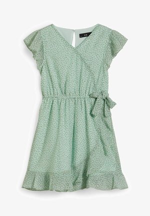 Vestido verde menta con mangas con volantes, diseño cruzado, cintura elástica y un dobladillo con volantes. Presenta un sutil patrón de hojas y un detalle de lazo en el lateral.