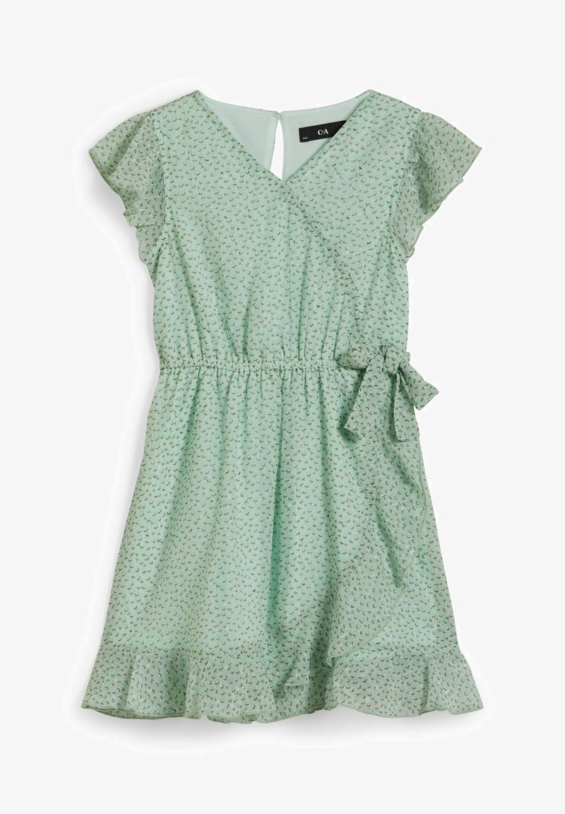 Robe vert menthe avec manches flottantes, design croisé, taille élastique et ourlet à volants. Présente un motif discret de feuilles et un détail noué sur le côté.