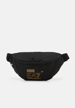 TRAIN CORE SLING BAG UNISEX - Jostas soma - black/gold