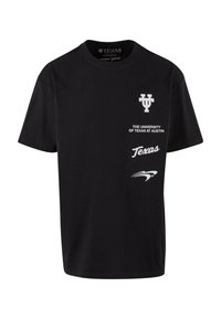 Must ära must T-särk klassikalise ümarkaelusega. Esiküljel on valgel trükitud tekst: "Texas Ülikool Austinis" ja "Texas", lisaks logo.