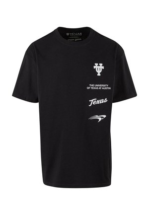 Black cotton t-shirt with a classic crew neckline. Features white printed text: "The University of Texas at Austin" and "Texas," plus a logo.