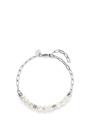 Silver chain bracelet with irregular white pearls and small silver spacer beads, featuring a lobster clasp and adjustable links.