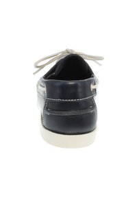 Marineblaue Leder Schuhe mit weißer Sohle, runder Zehenform, dekorativer Naht und beigen Schnürsenkeln. Rückansicht mit glatter, glänzender Oberfläche.