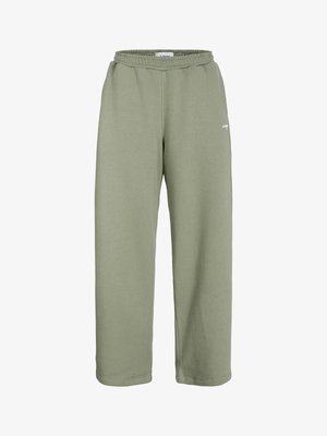 Olive green sweatpants made of soft cotton blend fabric, featuring an elastic waistband, loose fit, and minimalistic design with a small logo.