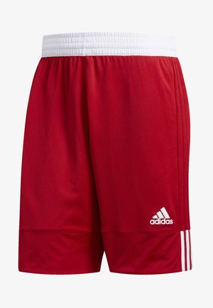 Pantaloni sportivi rossi realizzati in tessuto a rete, con una vita elastica bianca, tre strisce bianche sui lati e un logo Adidas all'orlo.