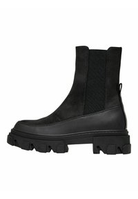 Svarta ankelboots med en slank design, tillverkade av en blandning av slät läder och mjuk mocka, med elastiska sidopaneler och en kraftig gummisula.