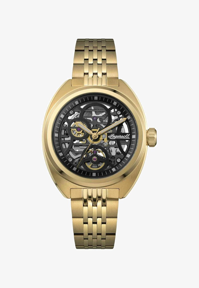 Goudkleurig roestvrijstalen horloge met een ingewikkelde zwarte skeleton wijzerplaat, met zichtbare tandwielen en paarse accenten, gemonteerd op een schakelarmband.