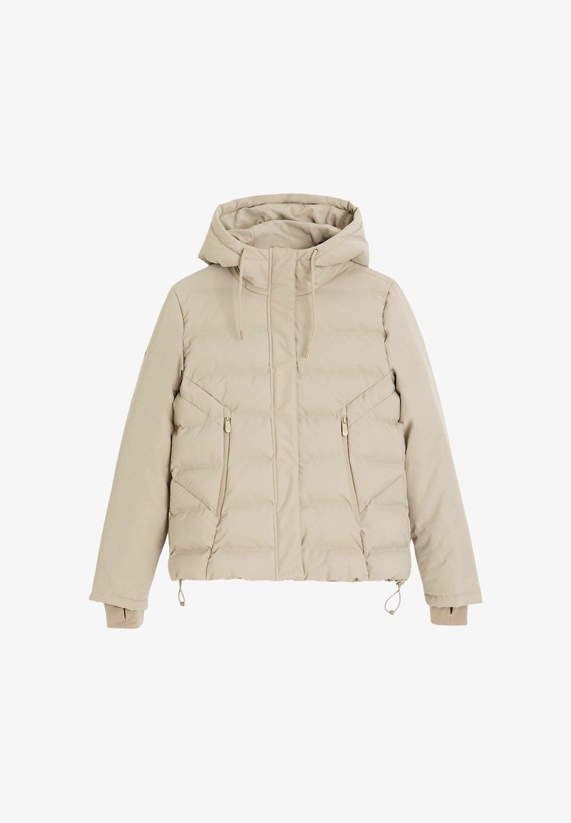 Beżowa pikowana kurtka z kapturem, z zamykanymi na zamek kieszeniami z przodu i sznurkiem ściągającym u dołu. Gładka faktura i detal w postaci przeszycia.