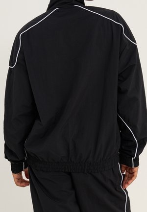 Übergangsjacke - black