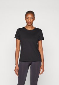 Black short-sleeve t-shirt, crew neckline, made of soft cotton blend, fitted shape, subtle logo detail on the front.