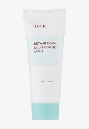 Tubetto bianco di iUNIK Beta-Glucan Daily Moisture Cream con etichetta e tappo azzurrino, contenente 15 ml di prodotto.