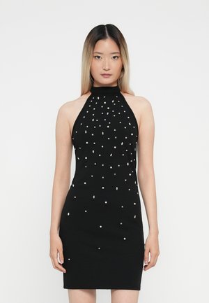 Black halter neck dress with a fitted design, adorned with clustered faux pearls and rhinestones, highlighting a smooth texture.