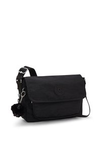 Borsa a tracolla nera con chiusura a pattina, tracolla regolabile, tasca frontale con zip e portachiavi a forma di piccolo monkey peluche attaccato.