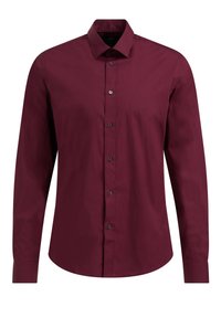 Långärmad skjorta i djup burgundy, tillverkad av mjukt tyg, med knäppning fram och svarta knappar, samt en klassisk kragsdesign.