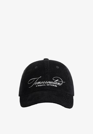 Black corduroy cap with a curved brim, featuring embroidered white text: “Tomorrowland A Magical Gathering.” Text is center-aligned on the front.
