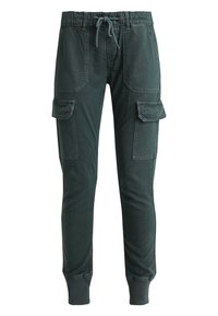 Pantalones jogger de carga en verde oscuro con cintura ajustable, bolsillos con solapa en los muslos y puños elásticos en los tobillos.