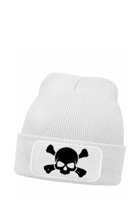 White knit beanie with a black skull and crossbones graphic on a rectangular patch. Textured fabric, rolled cuff design.