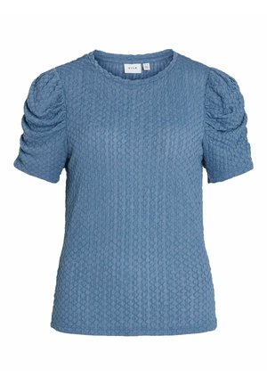 Haut bleu texturé à manches courtes avec manches froncées et encolure ronde, présentant un motif de petits points en relief subtils.