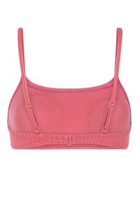 Bralette rosa con spalline sottili e regolabili, design senza cuciture, tessuto morbido e fascia testurizzata. Senza imbottitura né ferretto.