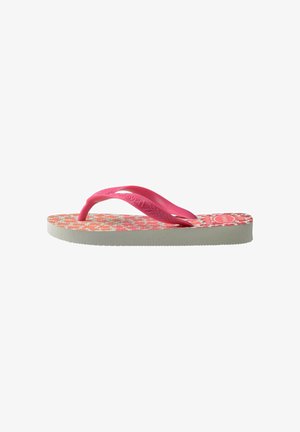 Infradito rosa con soletta decorata nei toni dell'arancione e del bianco. Presenta una fascia flessibile e una suola strutturata per una maggiore aderenza.
